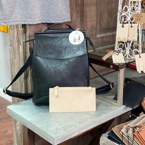 Sand colored vegan leather bi-fold wallet!